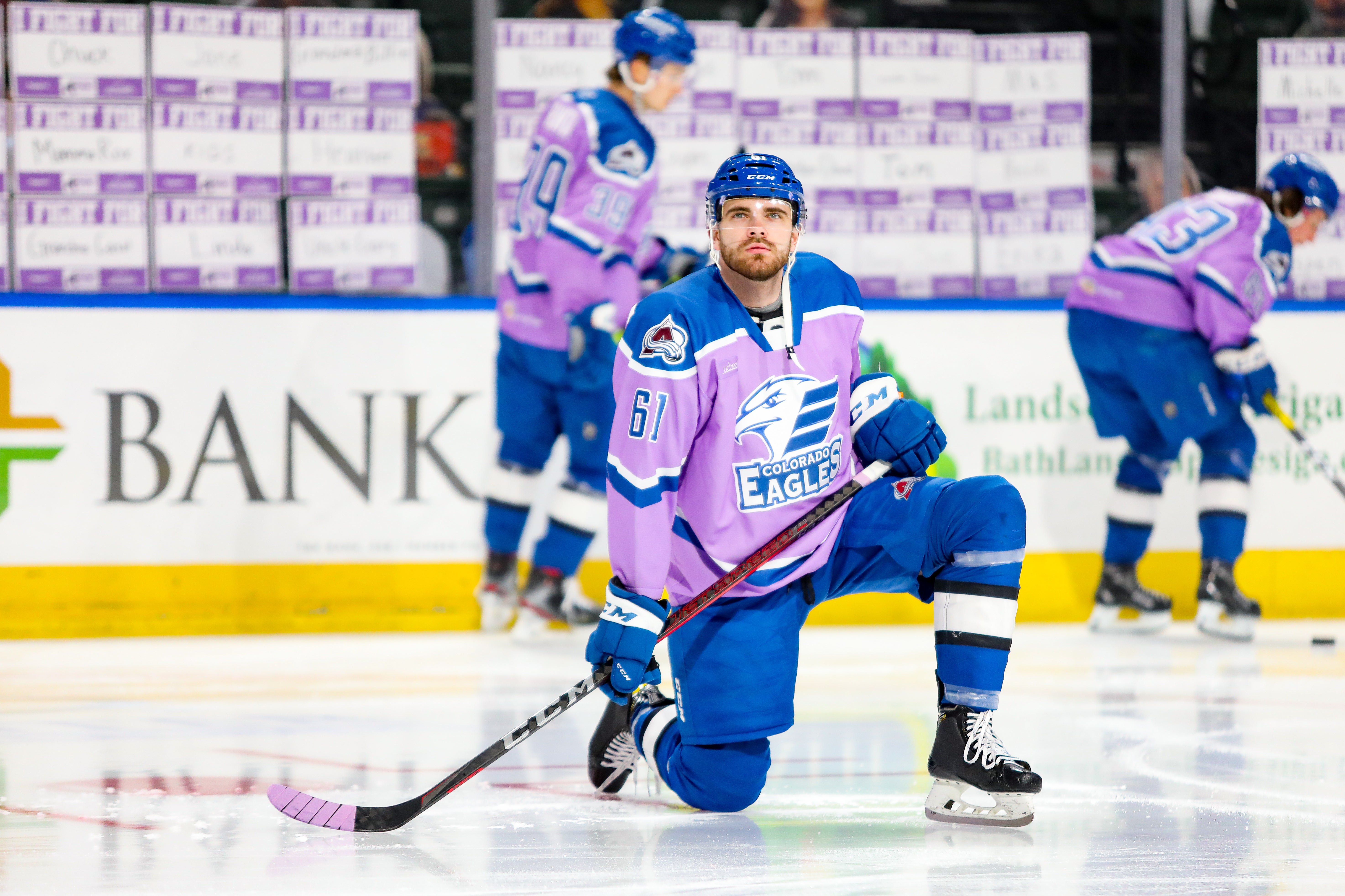 Hockey Fights Cancer warm up jerseys hang in the Colorado